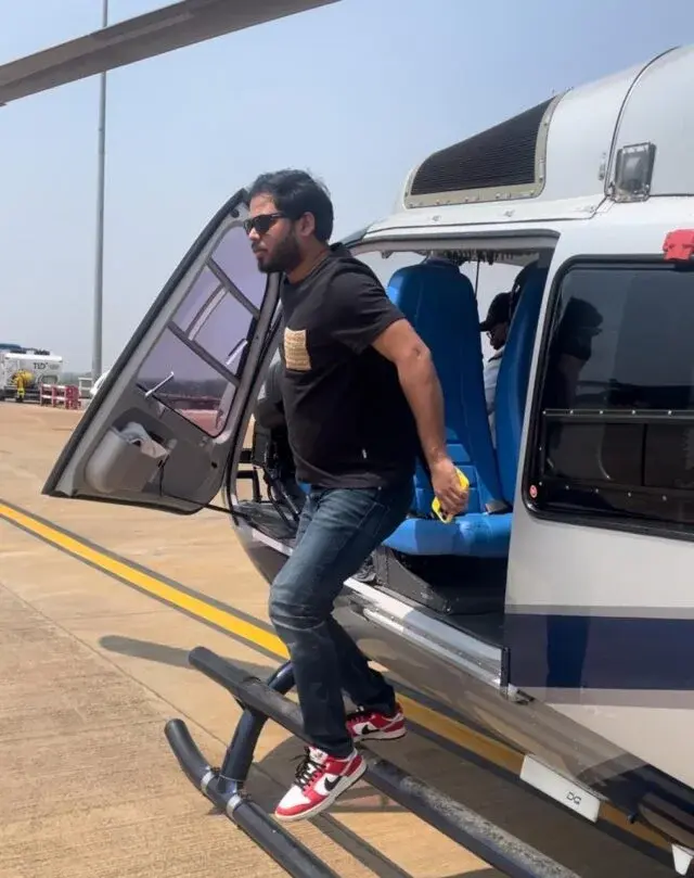 Abhinav Tripathi boarding a helicopter